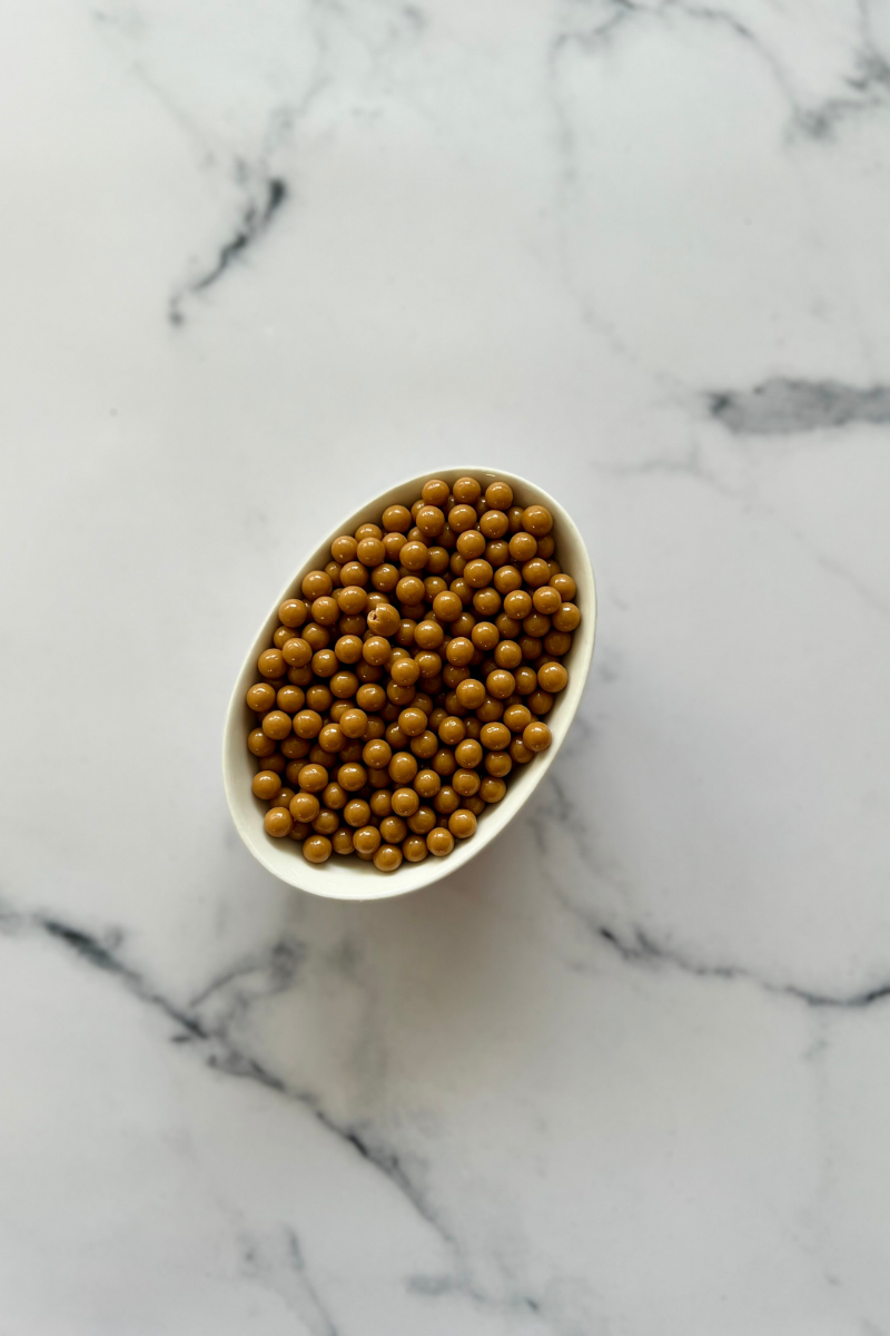 Valrhona Dulcey kuvertüüri pärlid, 100 g